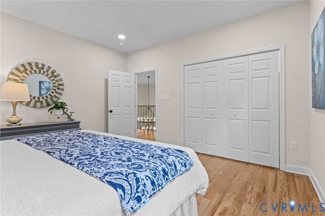1218 Old Hundred Road Midlothian, VA 23114 - Photo 29 of 37 Bedroom with light wood-type flooring, a closet, a
