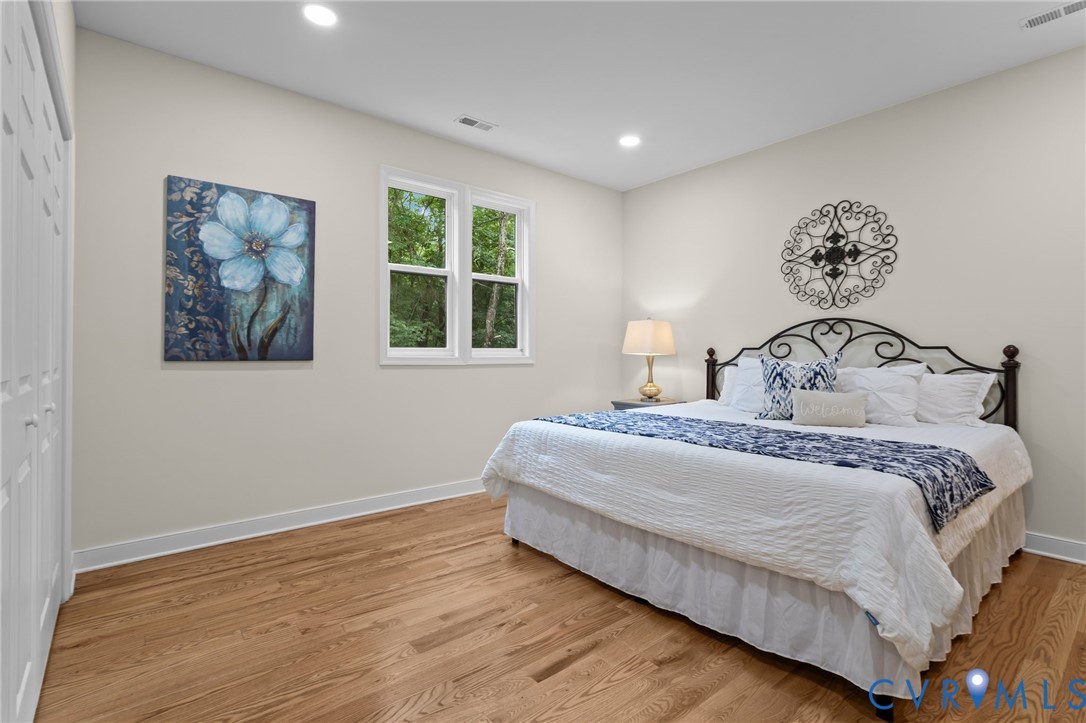 1218 Old Hundred Road Midlothian, VA 23114 - Photo 30 of 37 Bedroom featuring wood finished floors, a closet,