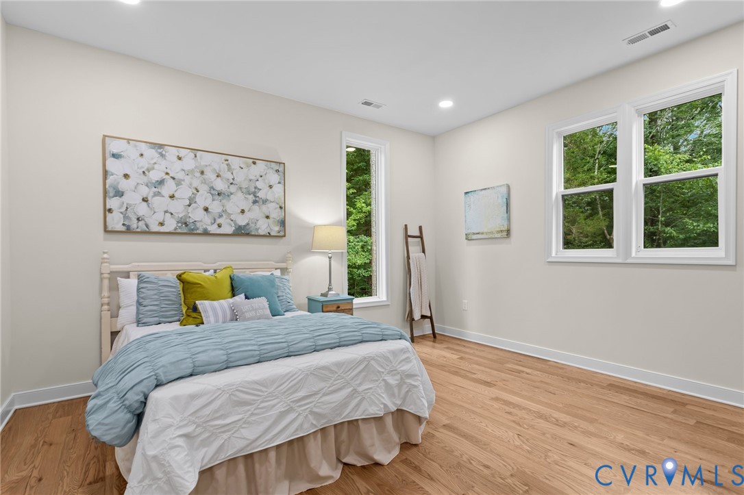 1218 Old Hundred Road Midlothian, VA 23114 - Photo 32 of 37 Bedroom featuring recessed lighting and light wood