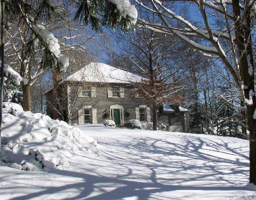 410 Galloping Hill Road Fairfield, CT 06824 - Photo 1 of 1 a view of a houses with snow on the road