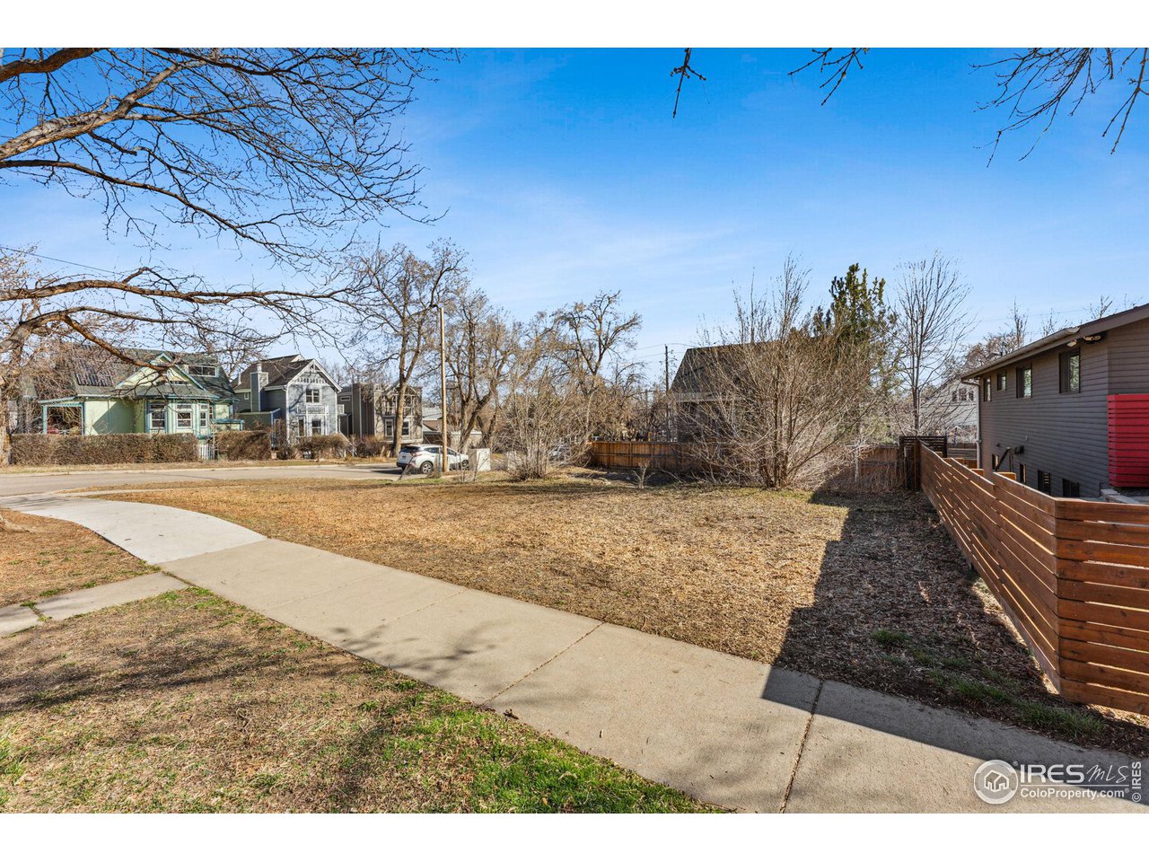 2240 Bluff Street Boulder, CO 80304 - Photo 5 of 26 a view of a yard and car parked