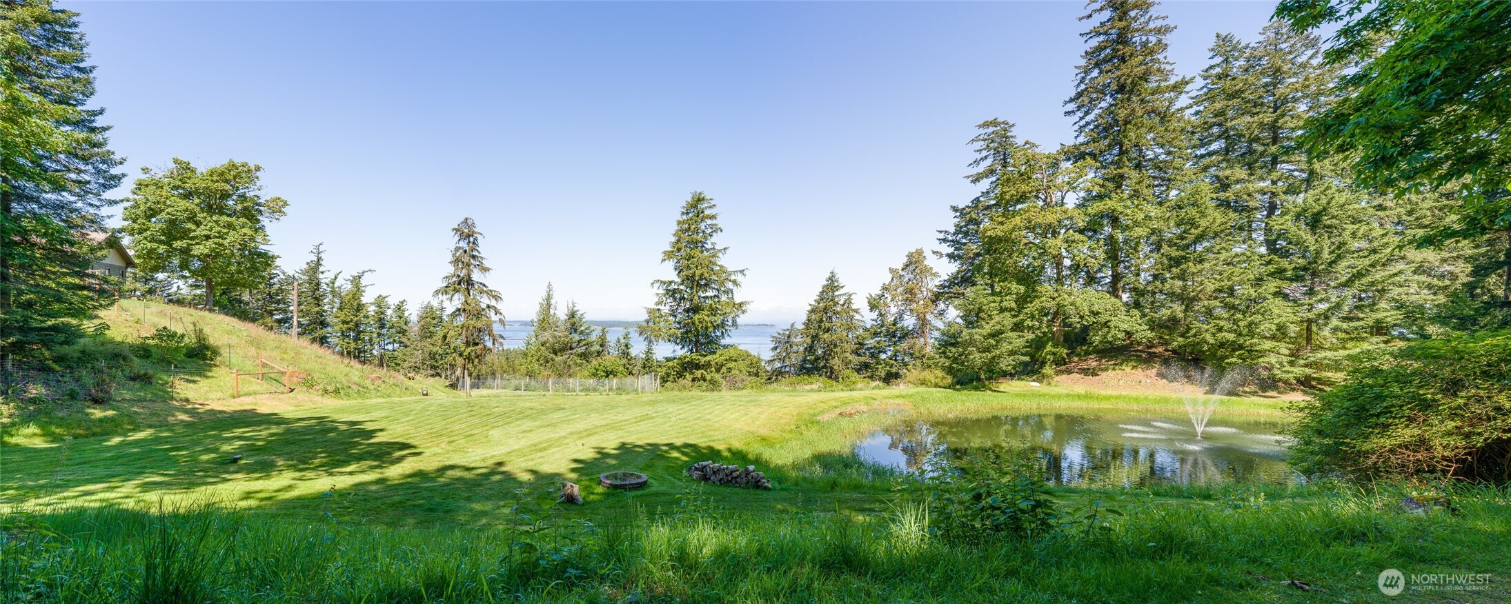 463 Wright Road Orcas Island, WA 98245 - Photo 3 of 40 a view of a lake with a big yard