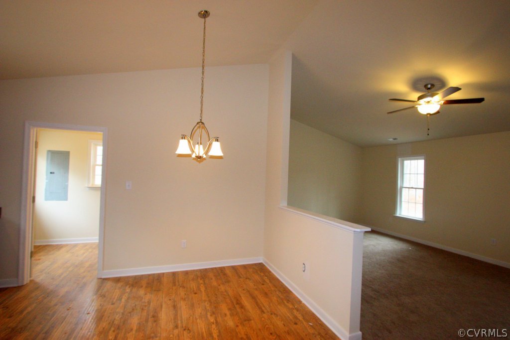 16 Winding Ridge Way Bumpass, VA 23024 - Photo 8 of 20 a view of a room with wooden floor and a ceiling fan
