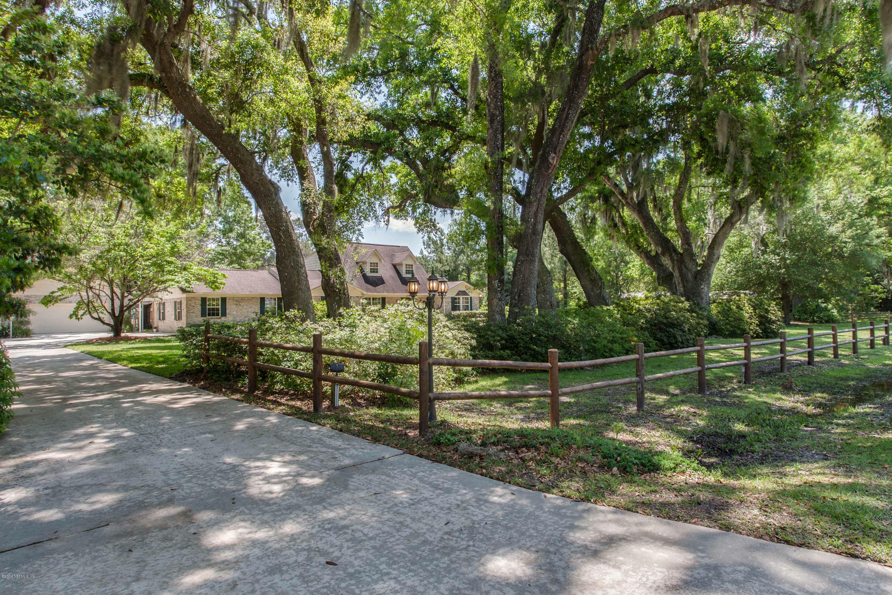43612 Ratliff Road Callahan, FL 32011 - Photo 3 of 40 a view of a park with large trees