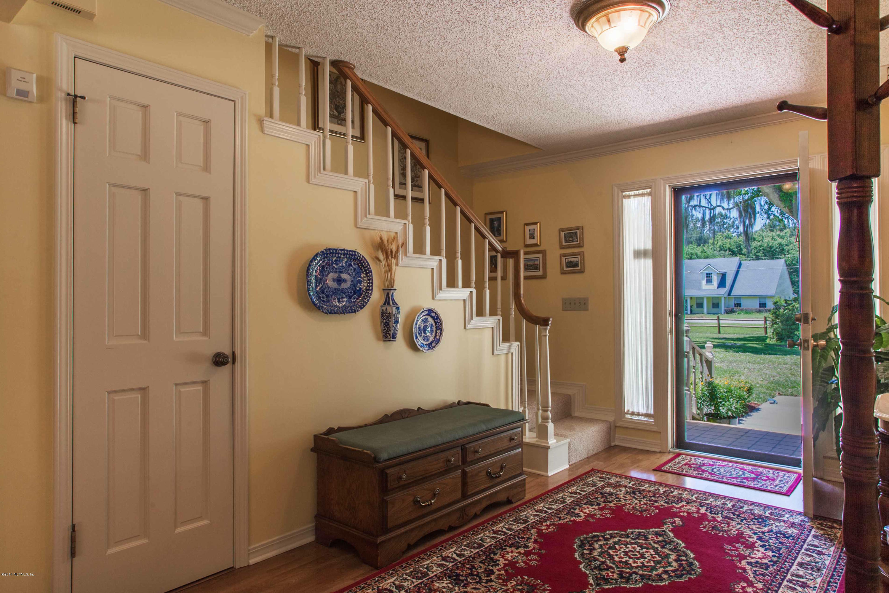 43612 Ratliff Road Callahan, FL 32011 - Photo 5 of 40 a living room with a couch and a window