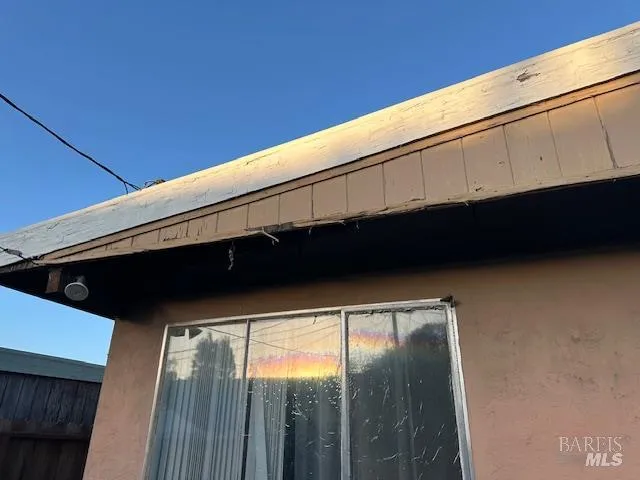 a bathroom with a shower and a mirror