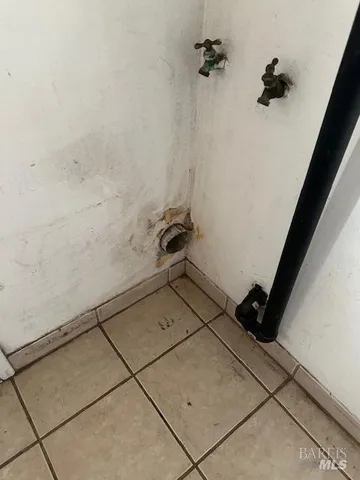 a bathroom with a toilet and a sink