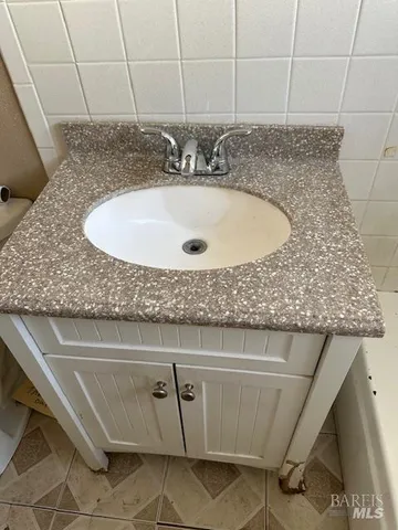 a view of a backyard of the house