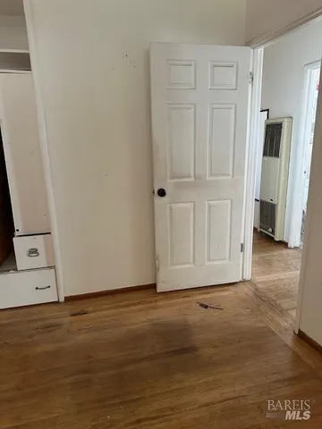 a view of a patio with furniture and a yard