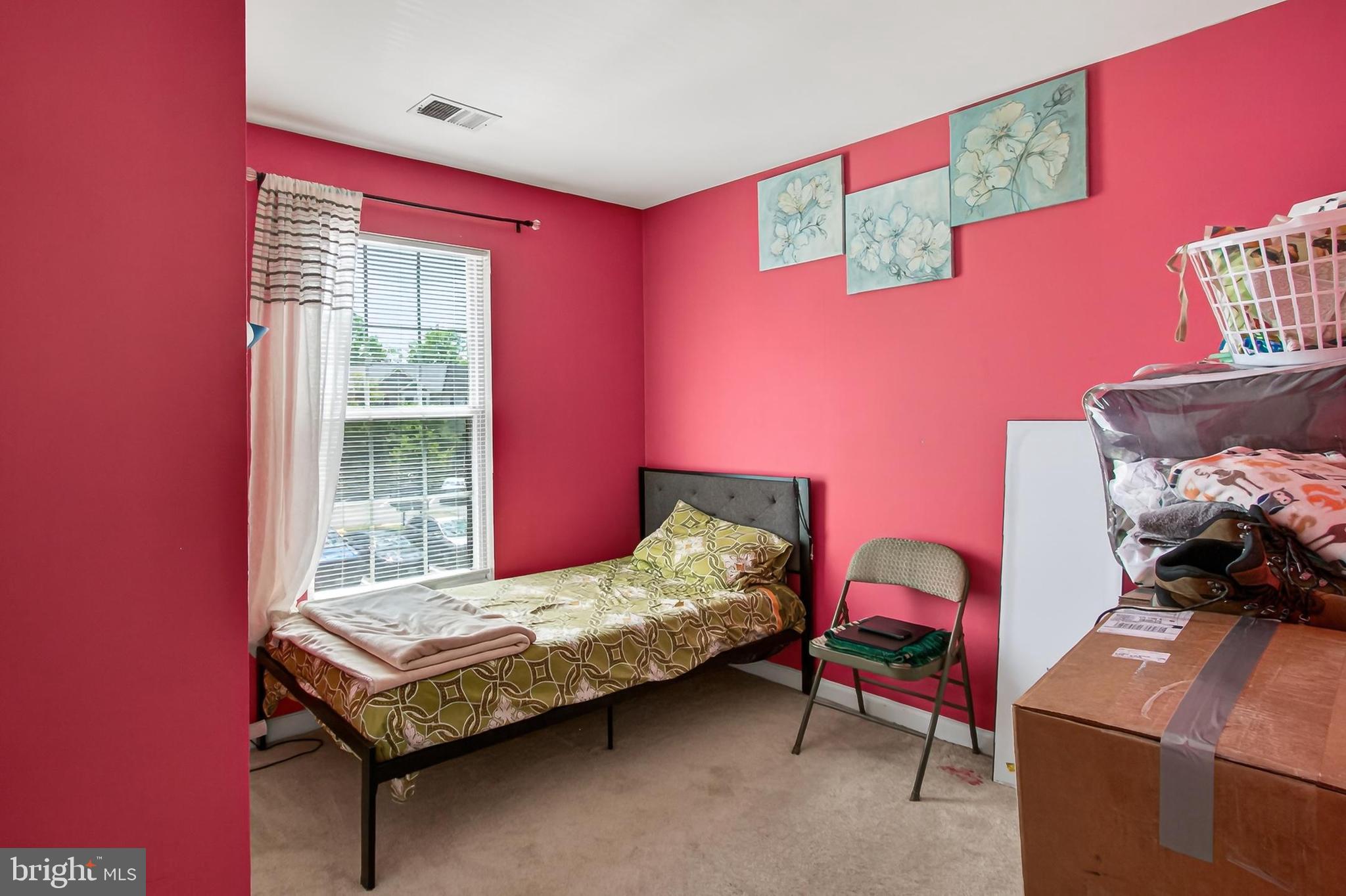 8602 Walcott Court Manassas, VA 20111 - Photo 28 of 53 a bedroom with furniture and a two windows