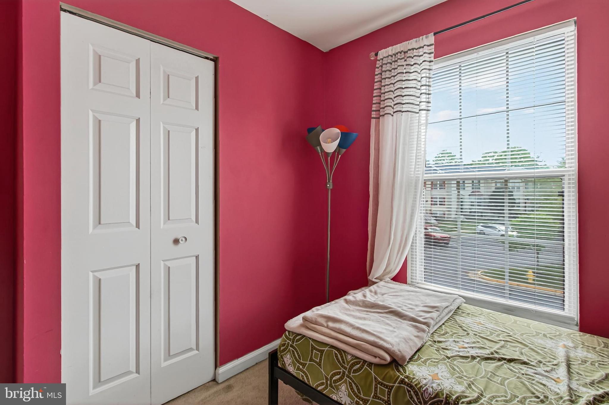 8602 Walcott Court Manassas, VA 20111 - Photo 29 of 53 a bedroom with a bed and a window