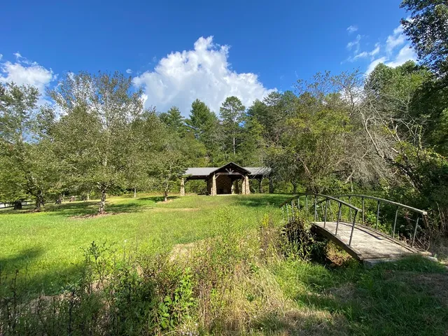 a view of a garden with a fountain