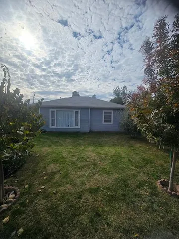 a view of a house with a garden