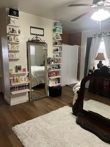 a bedroom with a bed and a walk in closet