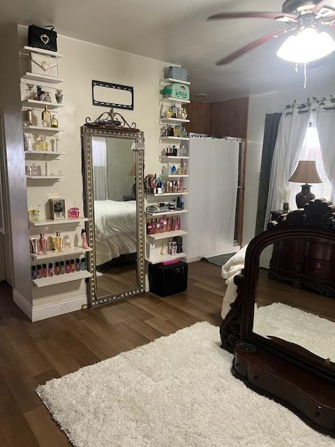165 East Linden Avenue Reedley, CA 93654 - Photo 19 of 19 a bedroom with a bed and a walk in closet