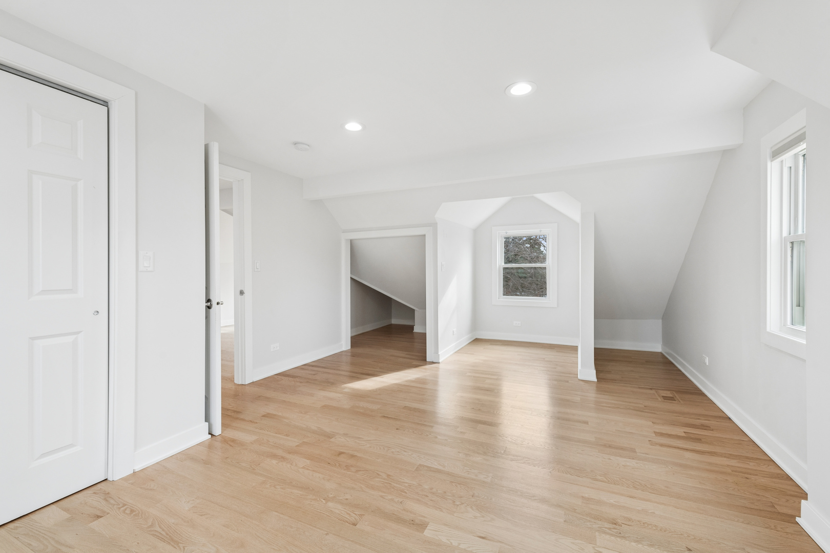 512 North Elm Street Mount Prospect, IL 60056 - Photo 14 of 24 an empty room with wooden floor and windows