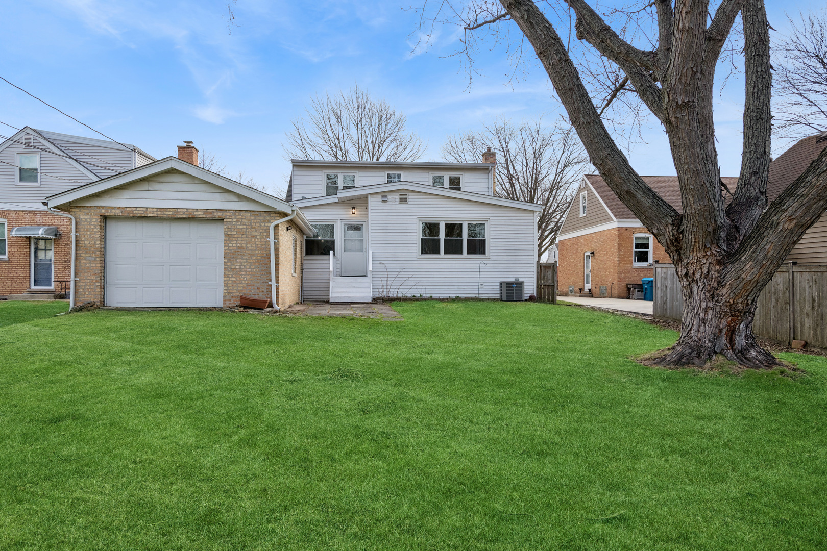 512 North Elm Street Mount Prospect, IL 60056 - Photo 20 of 24 a front view of house with yard and green space