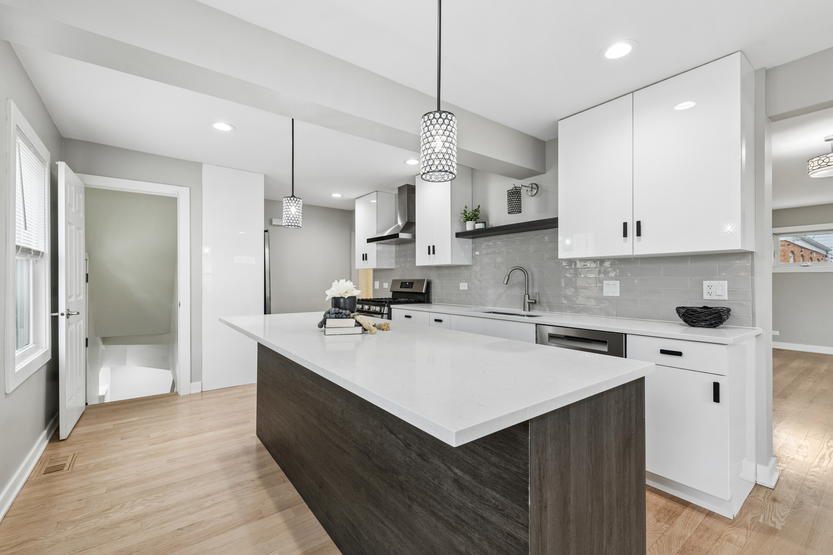 512 North Elm Street Mount Prospect, IL 60056 - Photo 6 of 24 a kitchen with a sink a counter top space stainless steel appliances and cabinets