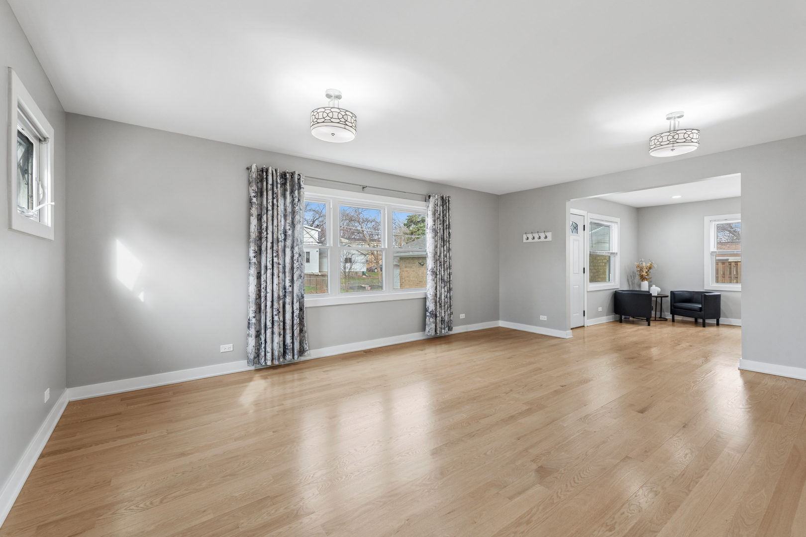 512 North Elm Street Mount Prospect, IL 60056 - Photo 7 of 24 an empty room with wooden floor and windows