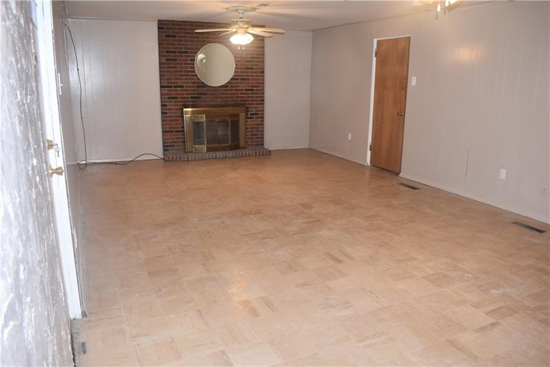 14 Beaver Grade Road McKees Rocks, PA 15136 - Photo 21 of 25 large Game room with fireplace and exterior exit