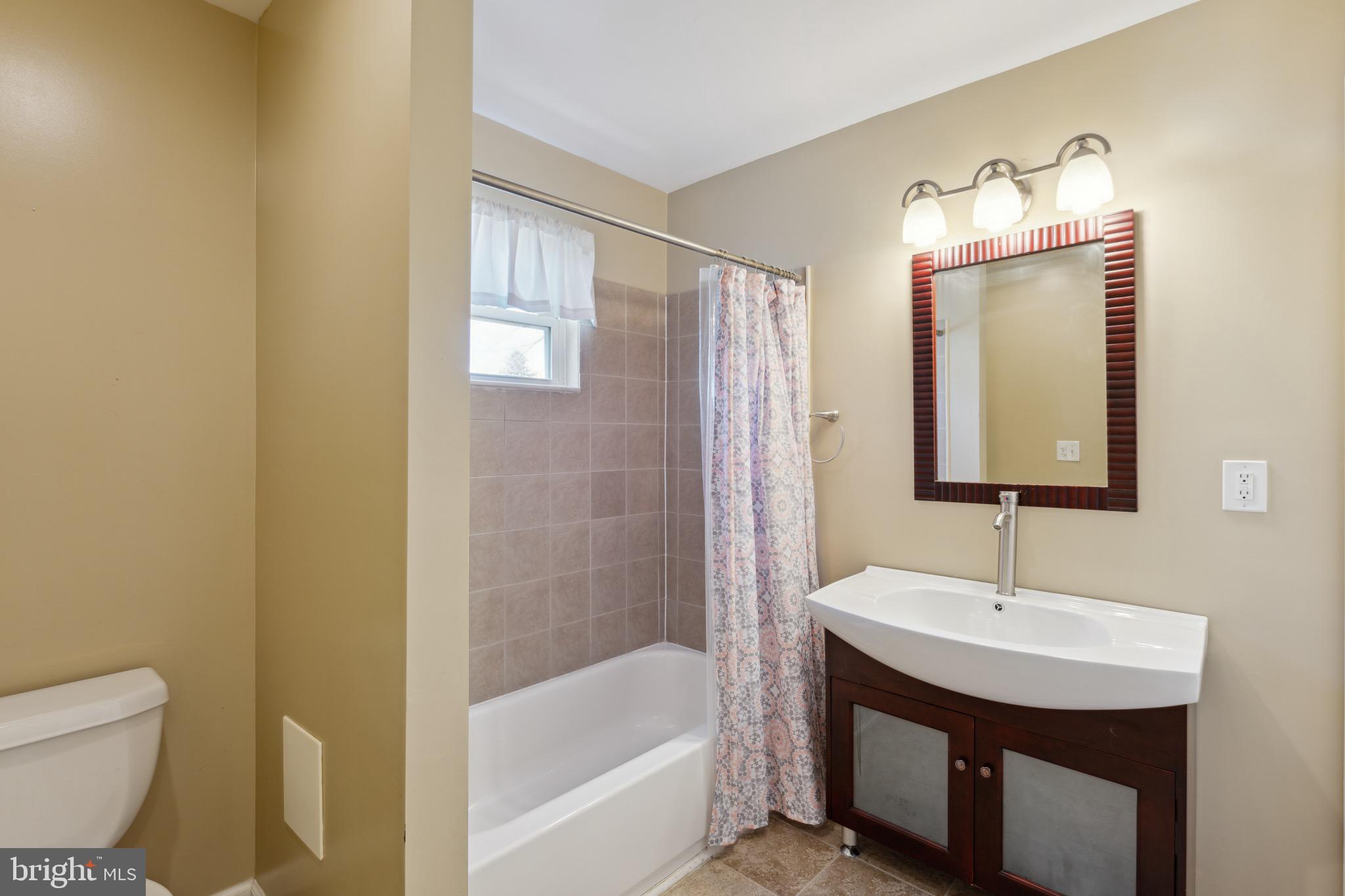 3124 Baybriar Road Baltimore, MD 21222 - Photo 25 of 29 Shared Hall Bathroom