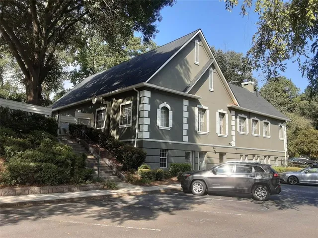 a car parked in front of a house