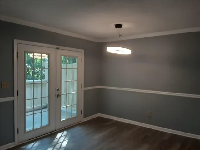 an empty room with windows