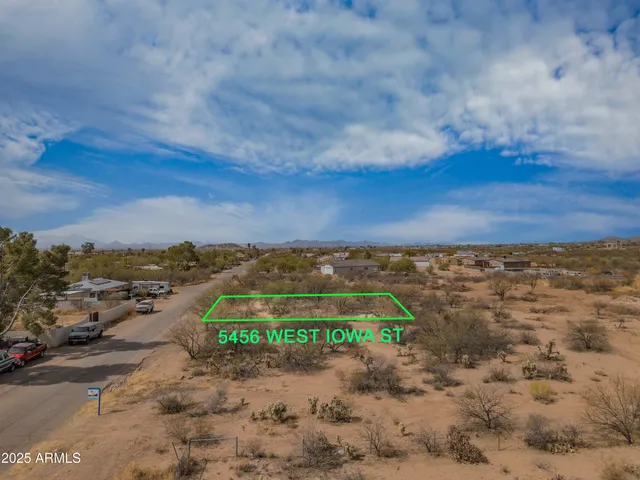 a view of a road with an ocean view