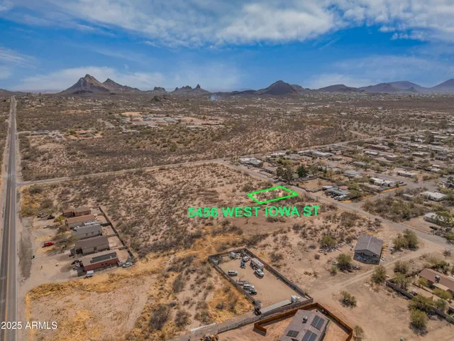 a view of a yard with a mountain