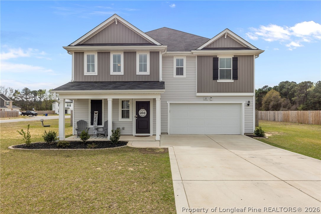 313 Graystoke Lane Raeford, NC 28376 - Photo 1 of 49 a front view of a house with a yard