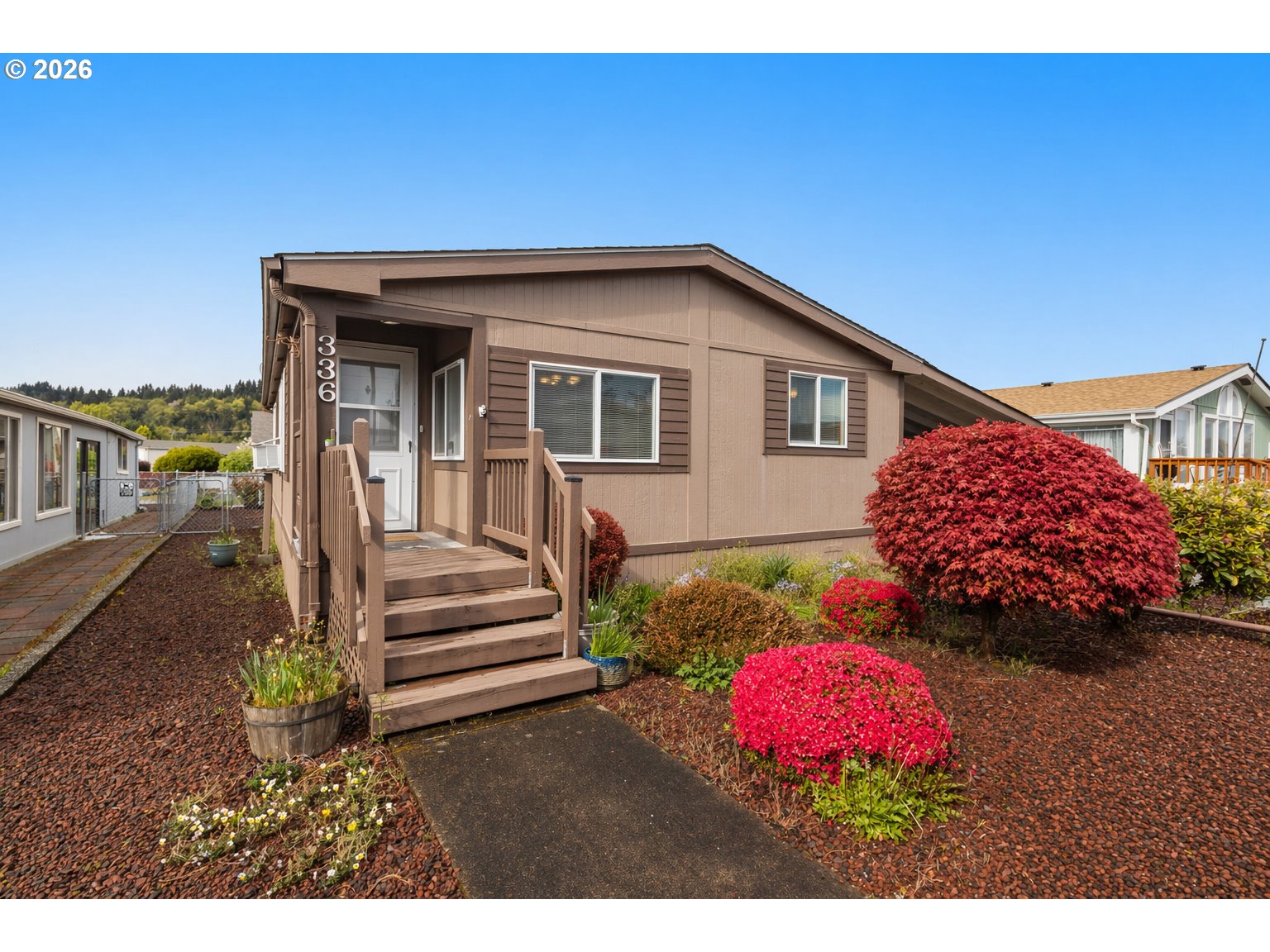 336 Franklin Place Longview, WA 98632 - Photo 2 of 28 a view of a house with a yard