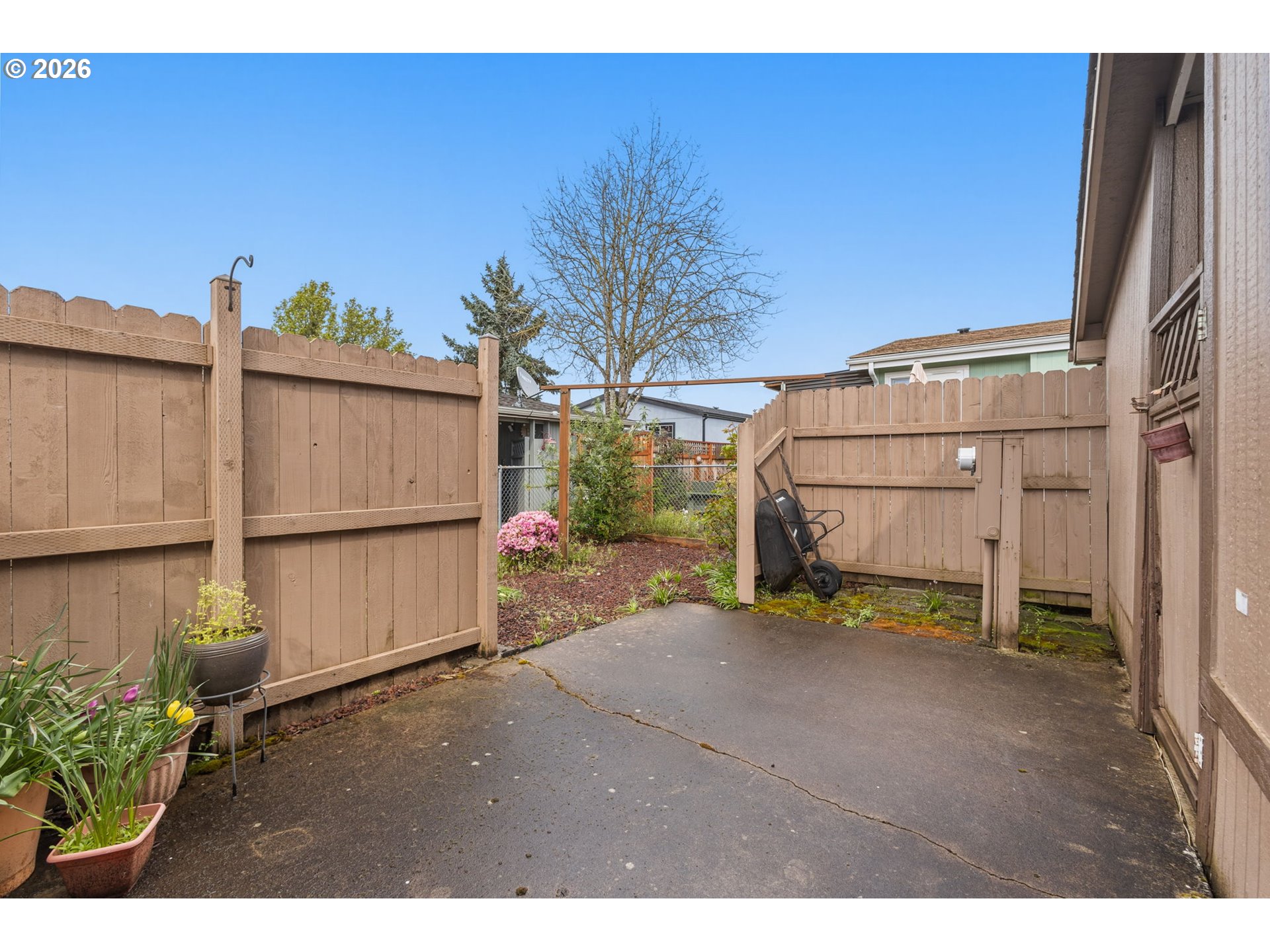 336 Franklin Place Longview, WA 98632 - Photo 24 of 28 a backyard of a house with bicycles parked