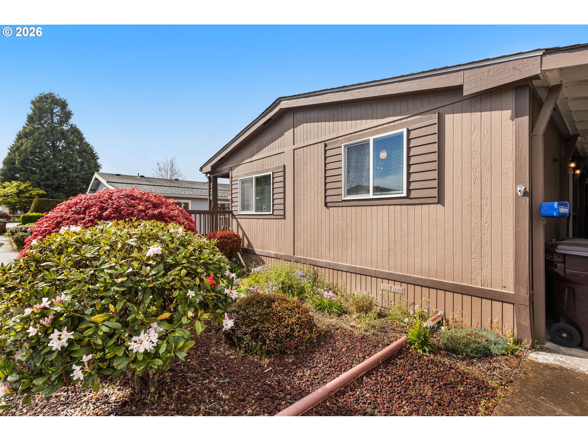 336 Franklin Place Longview, WA 98632 - Photo 3 of 28 a front view of a house with a yard