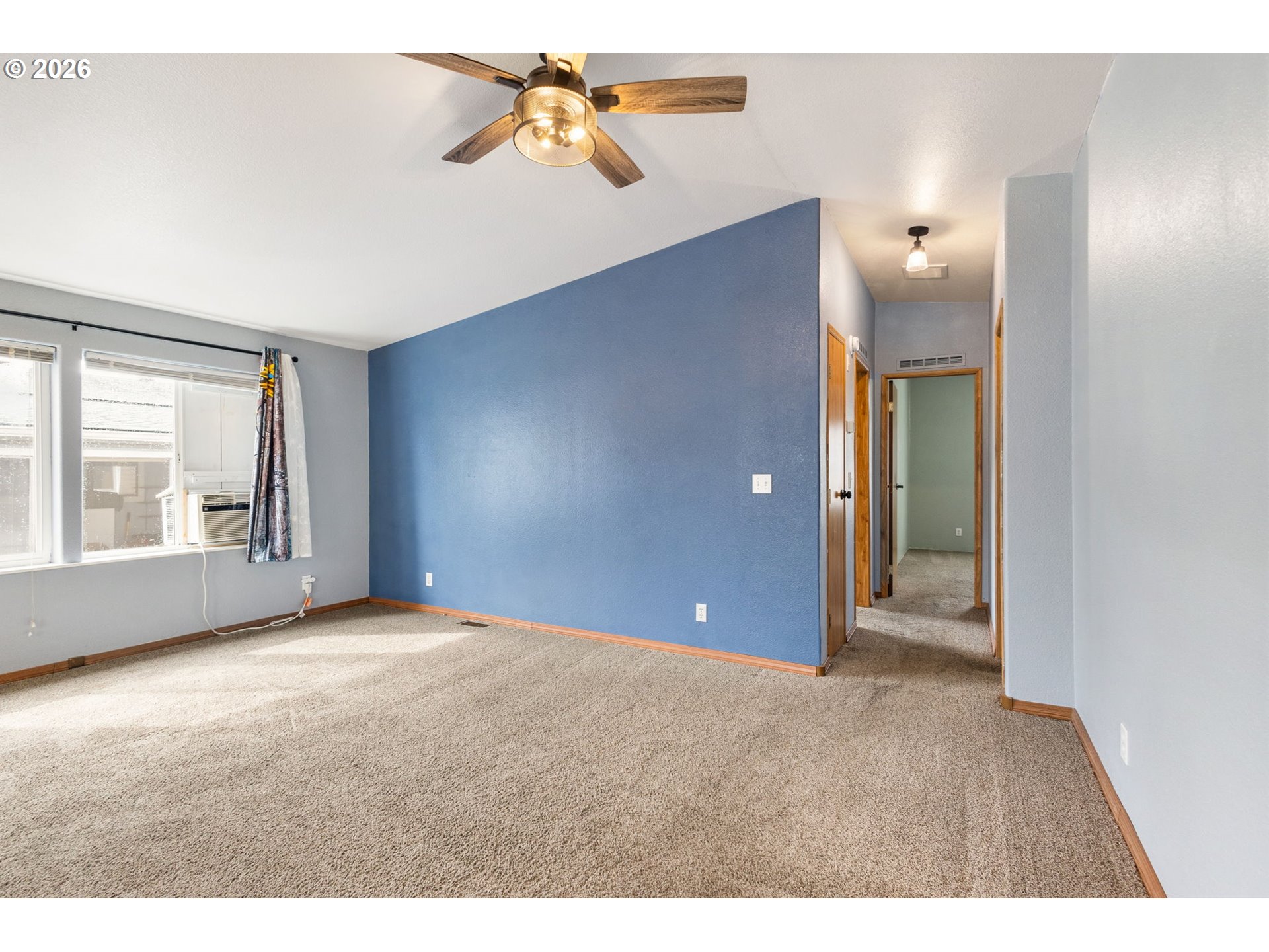 336 Franklin Place Longview, WA 98632 - Photo 5 of 28 a view of an empty room with window and cabinet