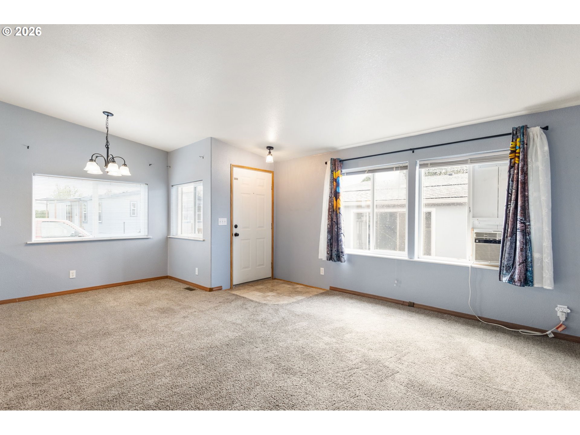336 Franklin Place Longview, WA 98632 - Photo 6 of 28 a view of an empty room with a window
