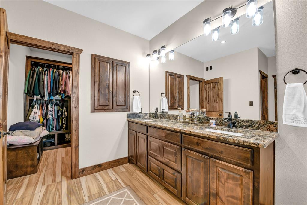 854 County Road 3330 Bridgeport, TX 76426 - Photo 16 of 40 The very spacious walk in closet has built-in custom shelving