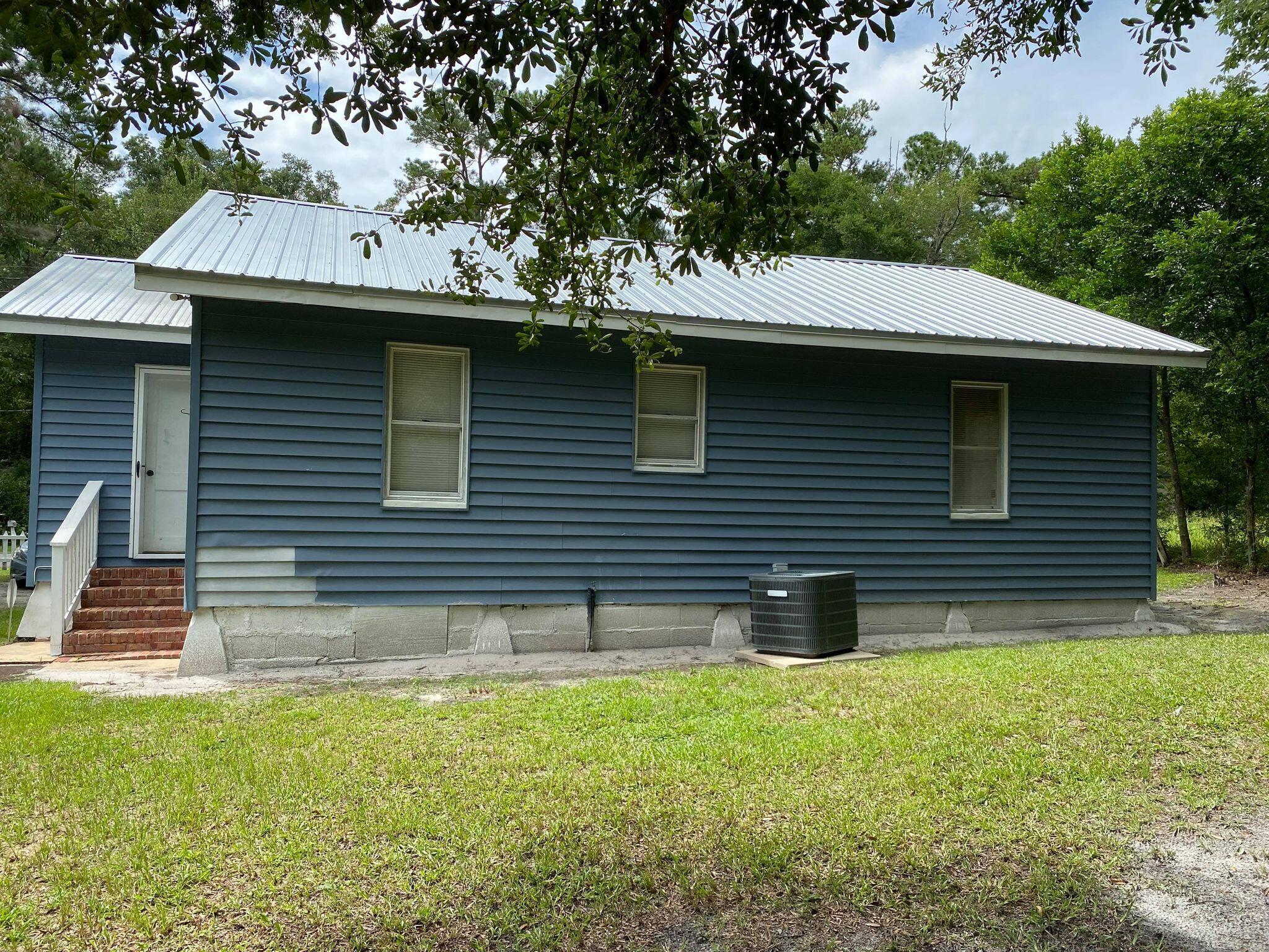 2802 Hiers Corner Road Walterboro, SC 29488 - Photo 3 of 8 Outside rear