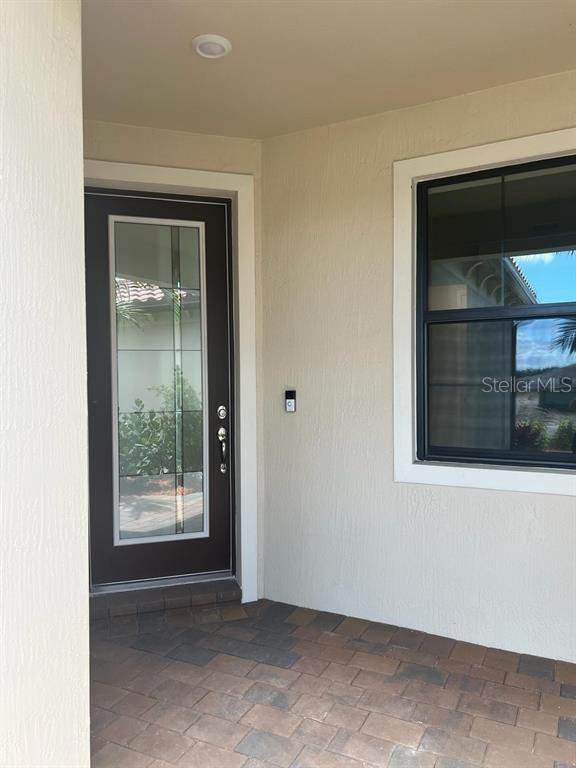 4139 Silver Maple Way Vero Beach, FL 32967 - Photo 16 of 29 a view of an empty room with a window