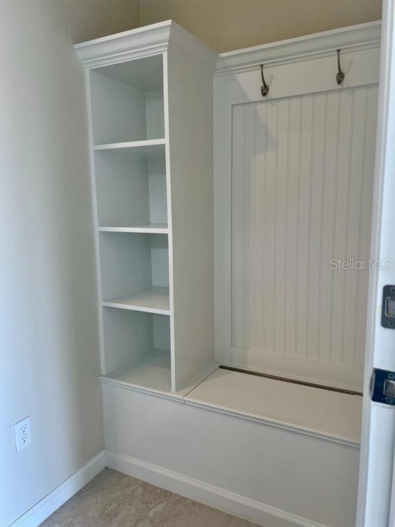 4139 Silver Maple Way Vero Beach, FL 32967 - Photo 18 of 29 a view of an empty walk in closet