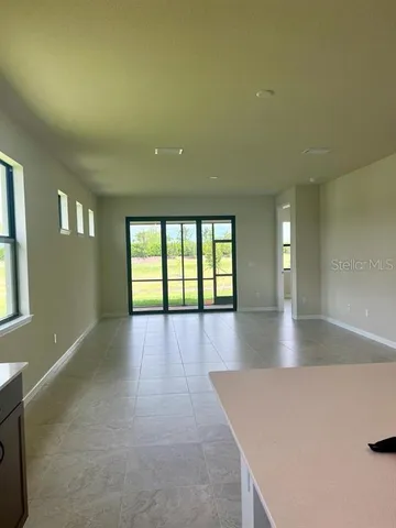 a bathroom with a glass door