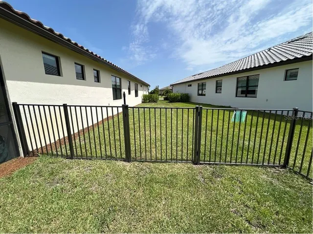 a front view of a house with a garage
