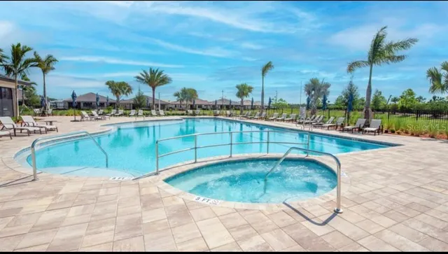 a view of a swimming pool and a terrace