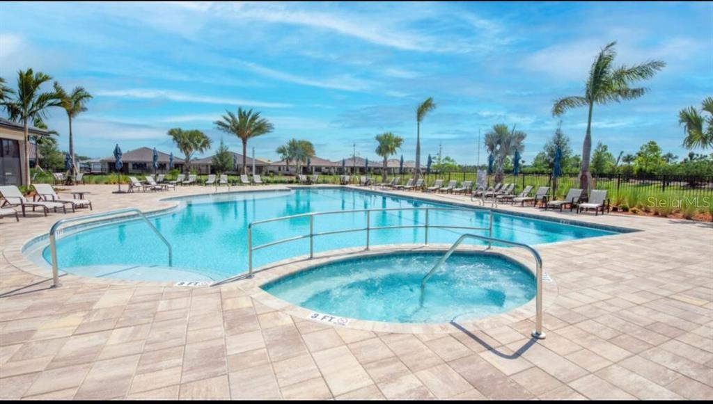 4139 Silver Maple Way Vero Beach, FL 32967 - Photo 4 of 29 a view of a swimming pool and a terrace