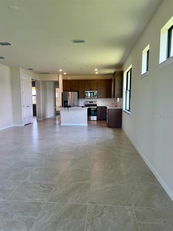 4139 Silver Maple Way Vero Beach, FL 32967 - Photo 10 of 29 a view of a livingroom with furniture and window