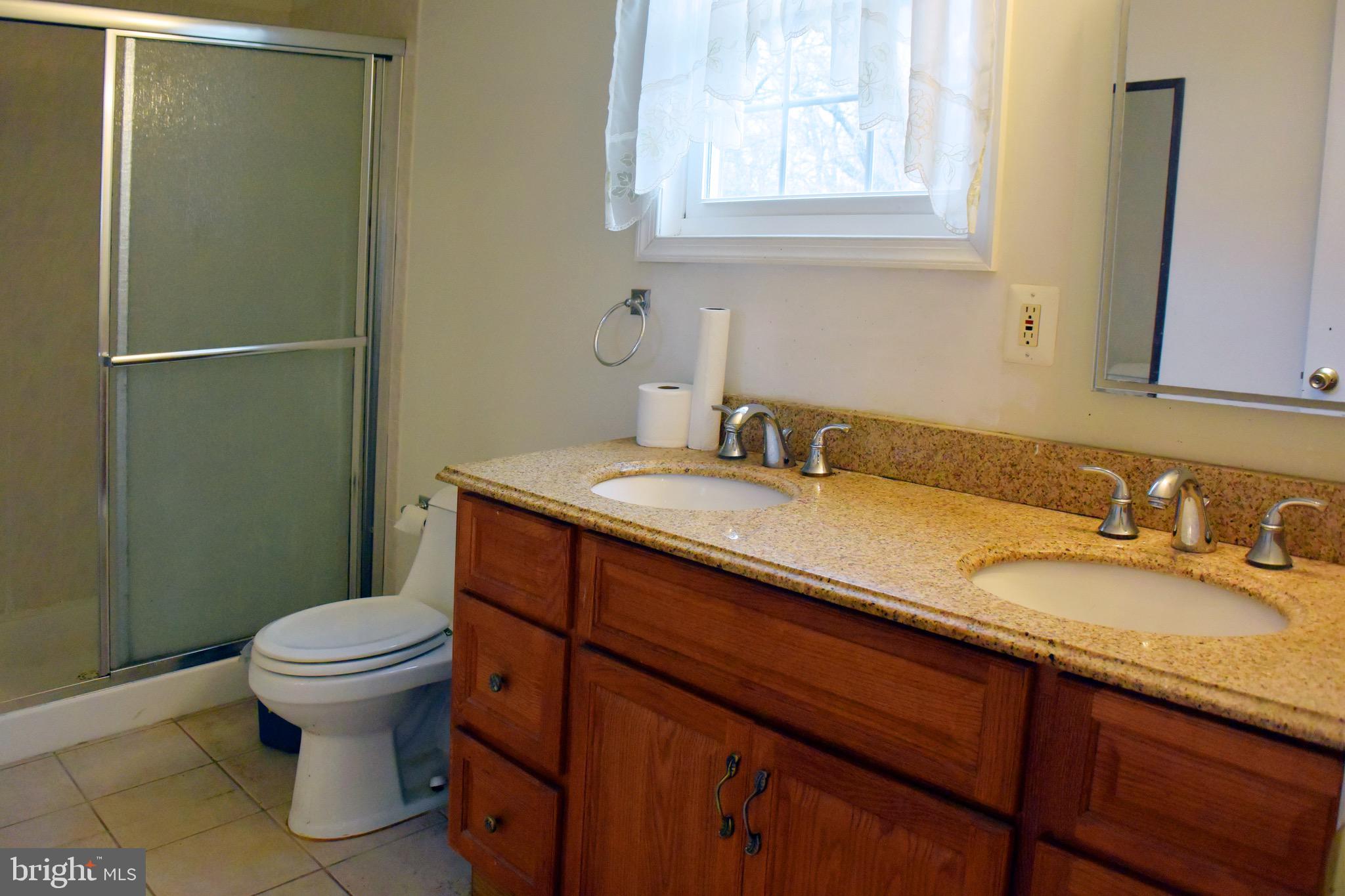 8404 Adelphi Road Adelphi, MD 20783 - Photo 18 of 29 MASTER BATH IN UPPER LEVEL