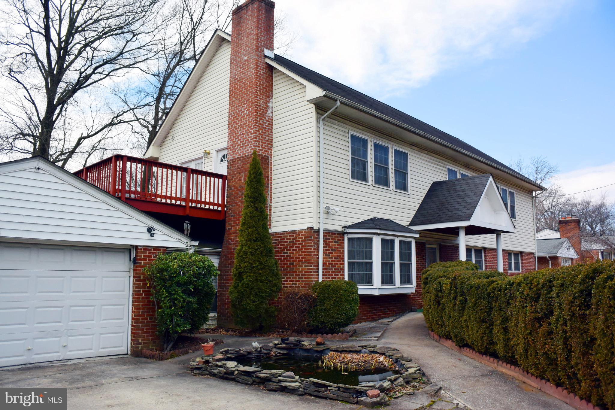 8404 Adelphi Road Adelphi, MD 20783 - Photo 29 of 29 FRONT VIEW WITH CAR GARAGE