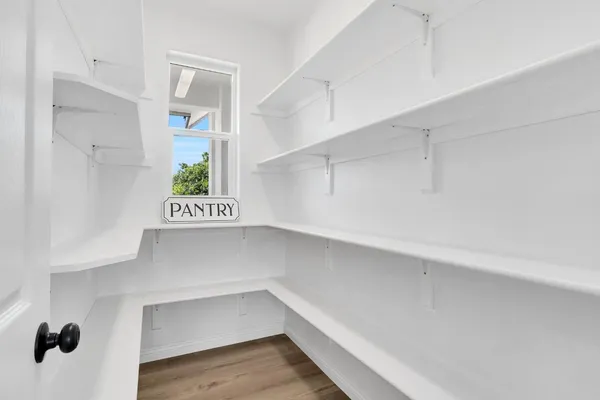 a view of an empty walk in closet