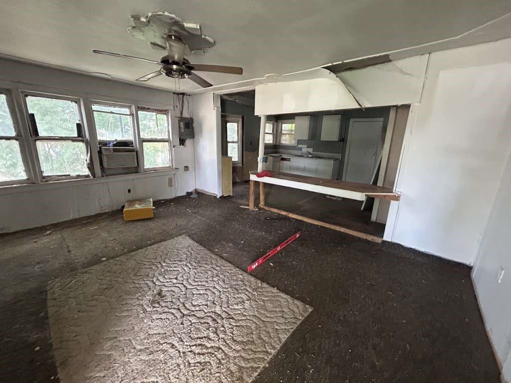 644 16th Street Colorado City, TX 79512 - Photo 3 of 12 a living room with a couch and a table