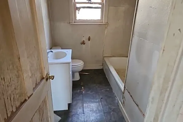 a bathroom with a sink and a toilet