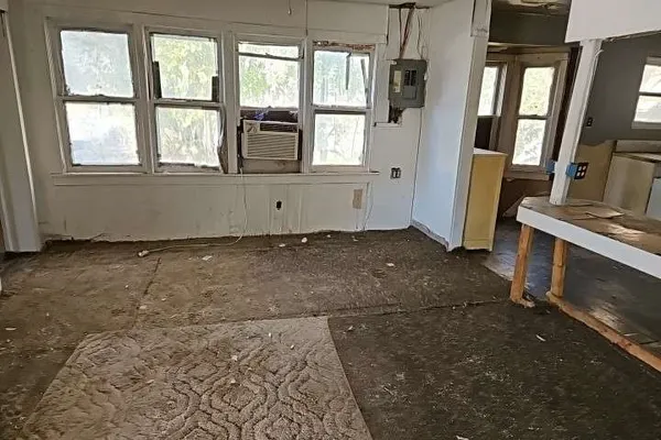 an empty room with windows